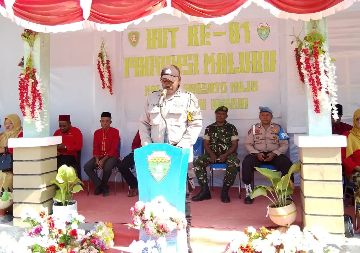 Brigpol Irfan Stenli Bacakan Sambutan Gubernur Pada Peringatan HUT Provinsi Maluku Ke 81 Di SMA Negeri 3 Tual